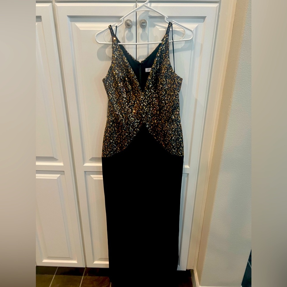 Classy jumpsuit with sequin embellishments. Chiffon wide leg bottoms.